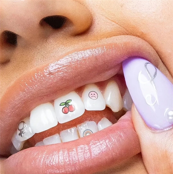 “发财”“上岸”刻牙上 牙齿上刻字成新玄学！专家：不建议