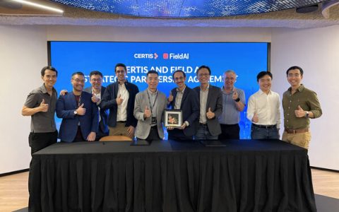 Certis President and Group CEO Ng Tian Beng (fifth from left) and FieldAI Founder and CEO Ali Agha (fifth from right) at the signing ceremony formalising the strategic partnership between Certis and FieldAI, aimed at advancing scalable autonomous robotics in live security environments.