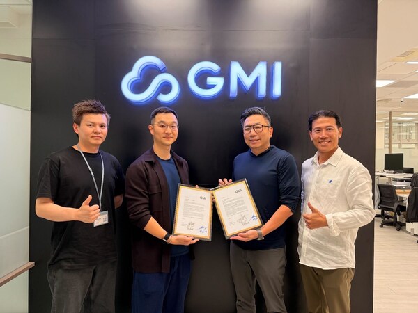 Four individuals pose in front of a GMI logo, holding signed documents as part of a collaboration announcement between Compal and GMI Cloud Four individuals pose in front of a GMI logo, holding signed documents as part of a collaboration announcement between Compal and GMI Cloud